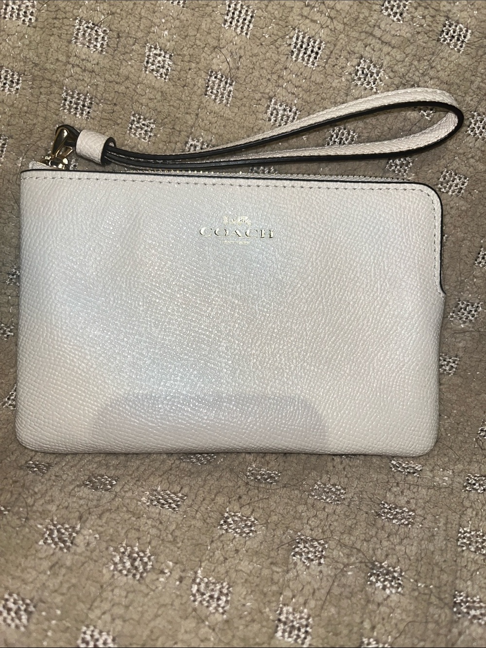 Coach cream corner, zip wristlet